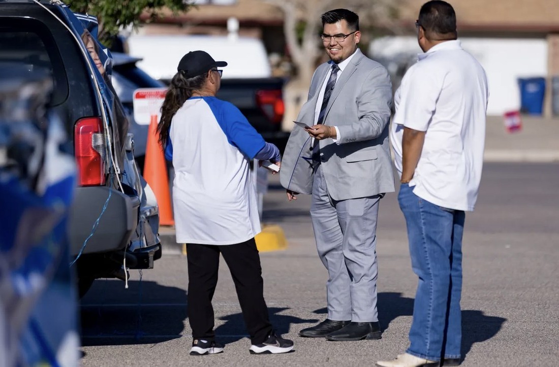 Jesse Moreno talking with community members